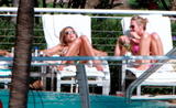 Jennifer Aniston sunbathing in bikini at her hotel in Miami Beach